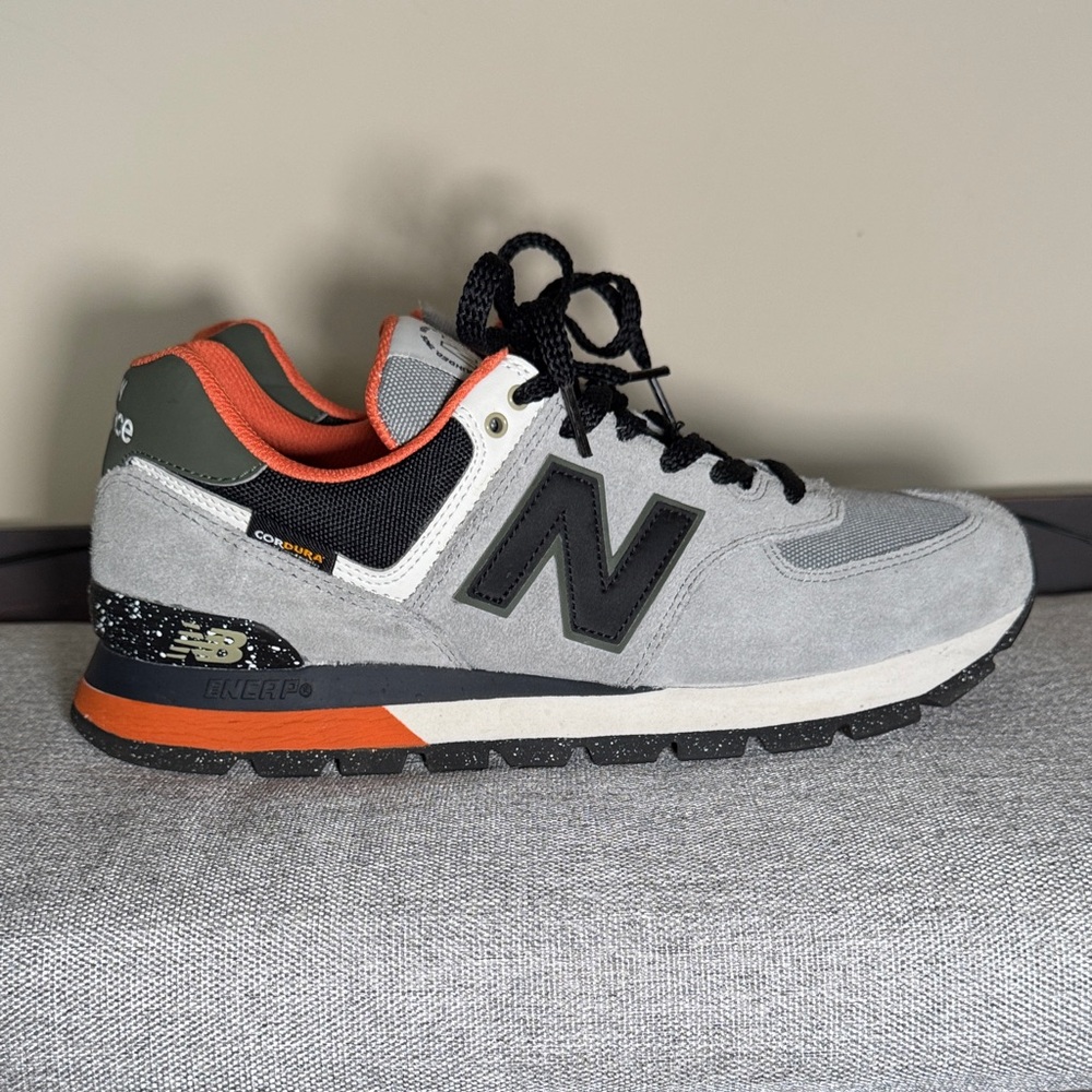 New Balance Men's Gray and Black Sneakers with Orange Accents